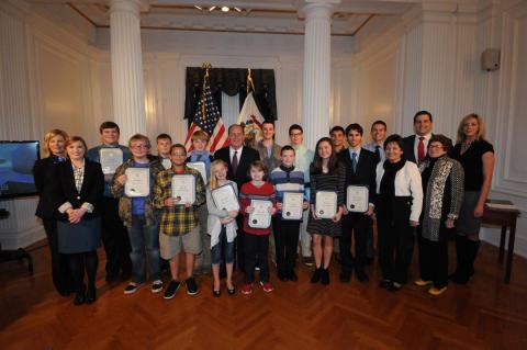 Fifteen West Virginia elementary school, middle school and high school students were honored Wednesday, Nov. 30, 2016 for designs of the West Virginia State Capitol building based on the Minecraft fantasy computer game.
