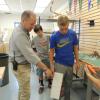 Local middle school students spent Friday afternoon developing shoe models for children dealing with cerebral palsy.